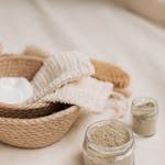 Elegant display of natural skincare products on a soft, neutral background.